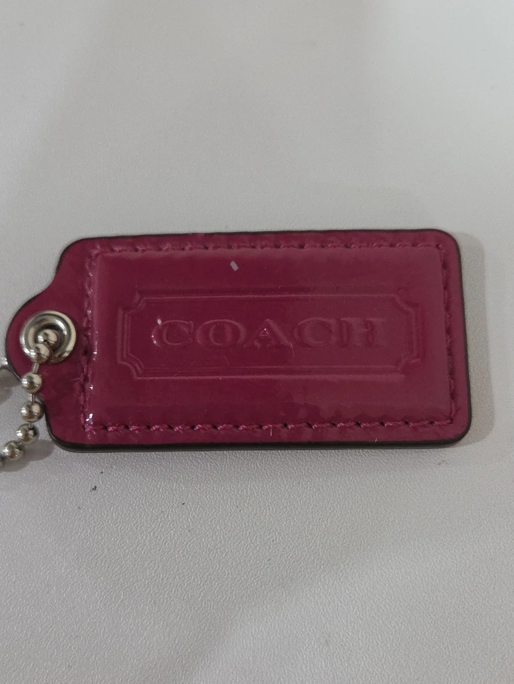 COACH Hot Pink Patent Leather Hang Tag with Ball Chain